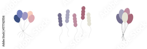 A set of assorted balloons floating in the air. Bundles of helium balloons on strings. Festive decoration.