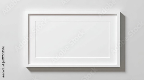 Horizontal white photo frame mockup on light neutral surface, top-down view, pure minimalist design, no text, no logo