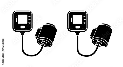 Two digital blood pressure monitors displayed in a simple black and white style