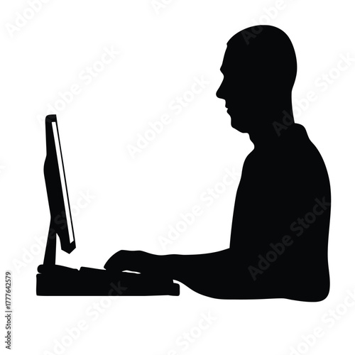 Side View Silhouette of Man Working on Desktop Computer