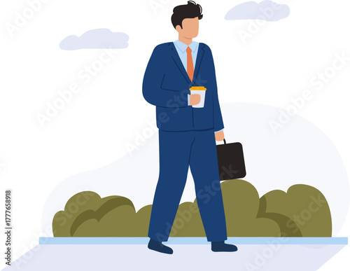 Businessman walking to work carrying coffee and briefcase