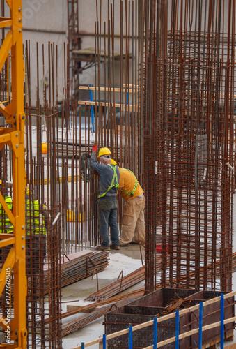Εκτύπωση καμβά Team of Builders Working with Rebar and Formwork on Site