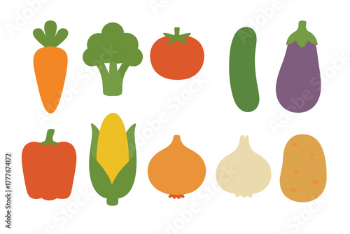 Colorful collection of fresh vegetables on a white background arranged in a pleasing pattern suitable for healthy meals