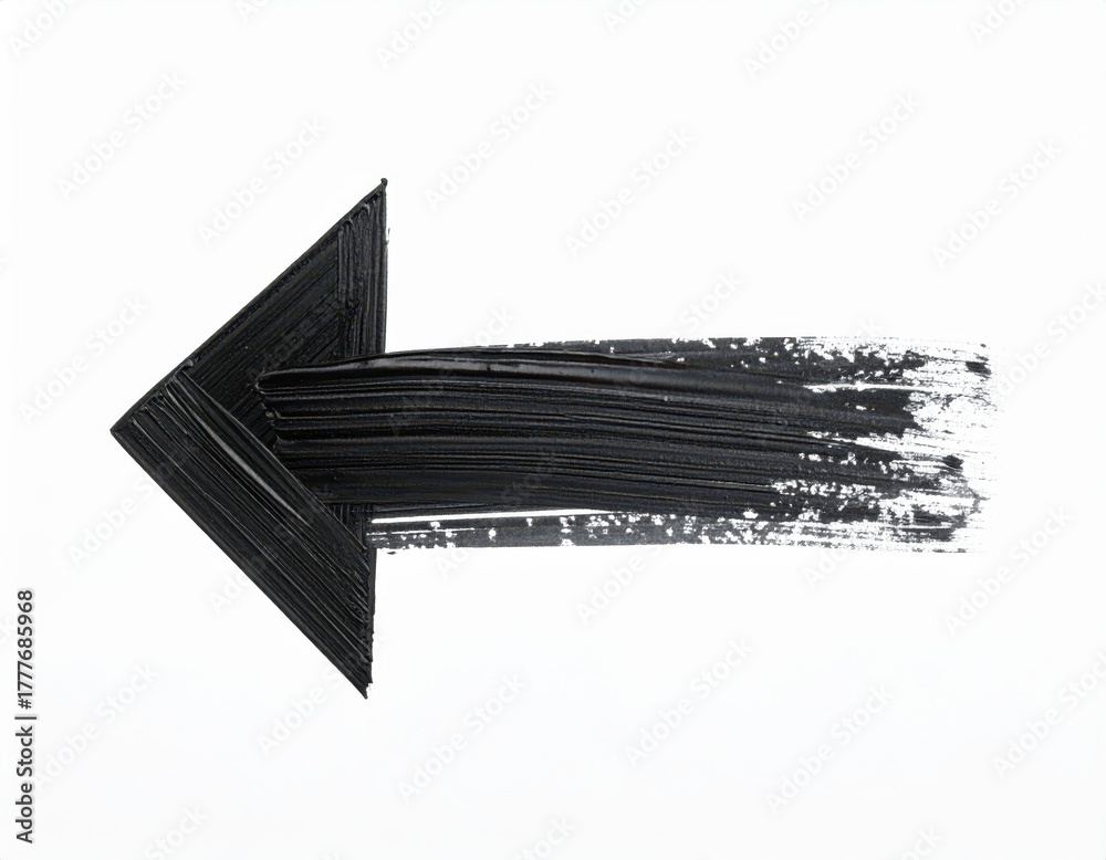 Obraz premium Dynamic black paint brush stroke forming an arrow on a white background, ideal for creative design and directional themes.