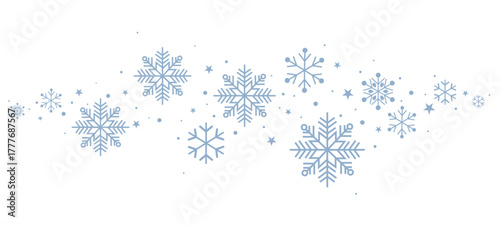 Seamless winter pattern featuring blue snowflakes on a white background. Minimalist festive design ideal for Christmas wrapping paper, holiday cards, textiles, and seasonal decorations.