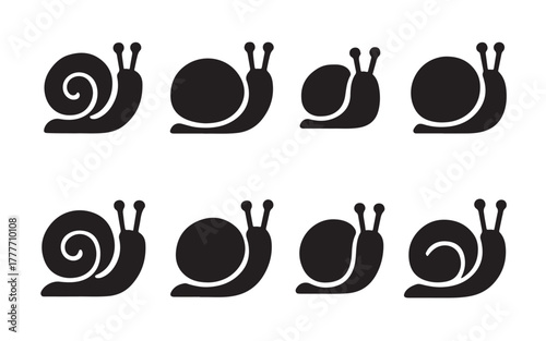 Black snail icons for slow speed concept and mollusk nature elements
