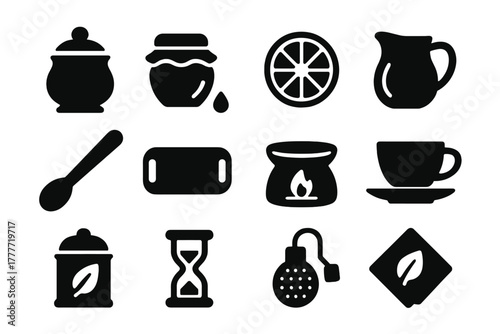 Tea Accessories Icons. Solid style icons of Tea accessories: sugar bowl, honey jar, lemon slice, milk jug, stirring spoon, tea