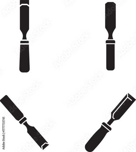 Set of four black silhouette chisels isolated on a white background in different orientations