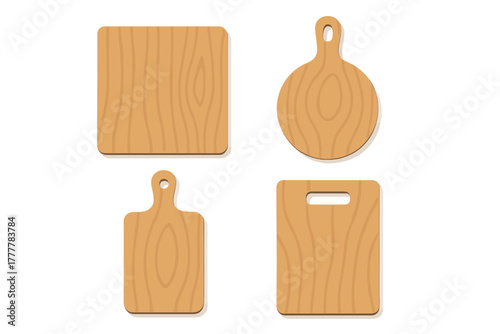 Set of four wooden cutting boards in various shapes for kitchen preparation