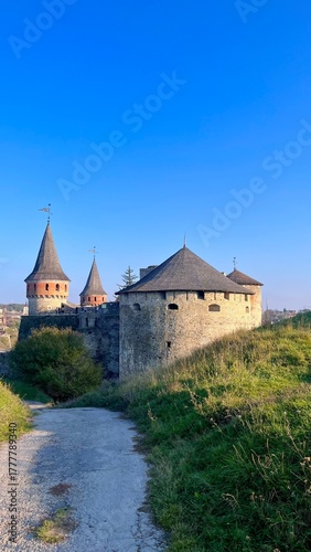 Kamianets-Podilskyi Fortress, medieval castle, Ukraine, tourism, history, grand architecture, autumn, sunny day, fortification, landmark