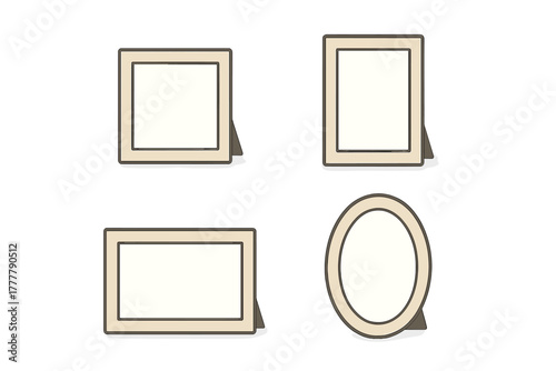 Four blank picture frames standing on a surface in various shapes and orientations