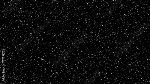 Black abstract texture with white dust particles or scattered stars on a dark background, ideal for digital overlay effects.
