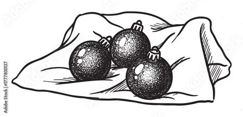 Three detailed, traditional christmas ornaments rest on a gently draped cloth, showcasing intricate shading and texture.