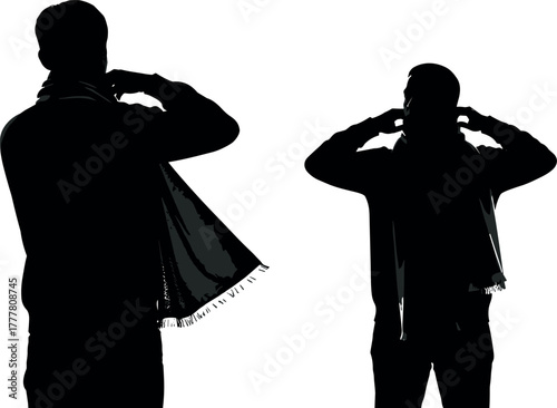 Two men in silhouette adjusting their scarves captured against a stark white background.