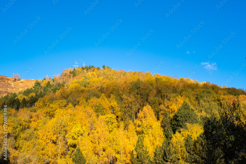 Fototapeta premium Autumn landscape in the mountains at sunset near Almaty, Kazakhstan.
