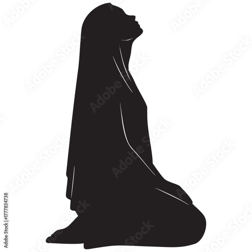Silhouette of Woman Kneeling and Looking Up