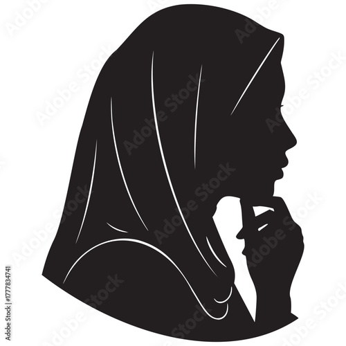 Silhouette of a Woman Wearing a Hijab