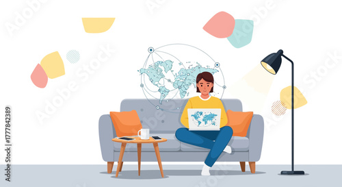 Young woman working remotely with a laptop at home surrounded by travel themed elements