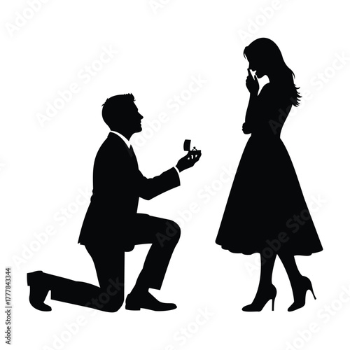 Silhouette of a man proposing marriage to a woman with a ring box