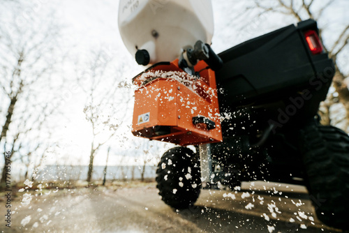 Photos Close-Up of Salt Spreader in Operation
