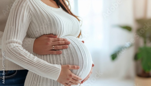 A loving couple's hands tenderly embrace a pregnant woman's baby bump, symbolizing profound connection, love, family, and the joyous anticipation of new life