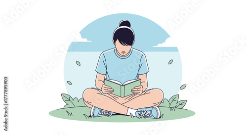 Young Woman Reading A Book Enjoying Leisure Time Sitting on The Grass Outdoors