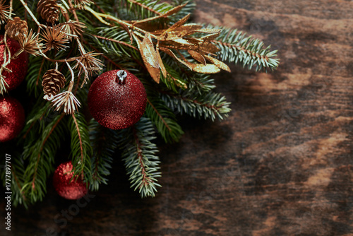 An arrangement of natural spruce and fir with Christmas balls. Top view. Copy space. Christmas design