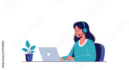 A woman wearing a headset works on a laptop next to a potted plant.