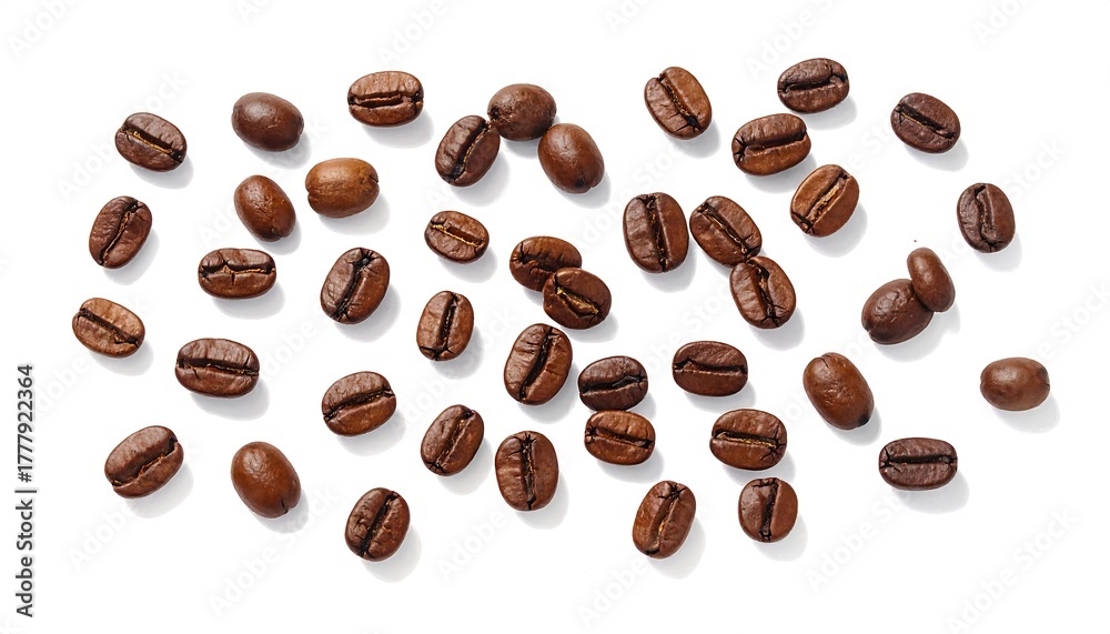 Obraz premium Scattered, roasted brown coffee beans on a white background, creating a simple, clean and minimalist composition