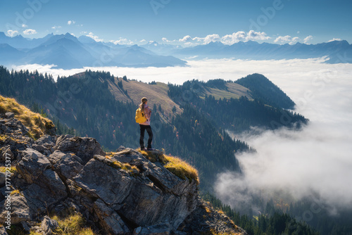 Woman with yellow backpack ...