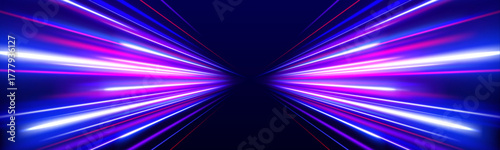 Blue and pink lights burst across the expressway in rapid motion. The glowing blur represents futuristic energy. It’s a vision of modern transport and endless speed.