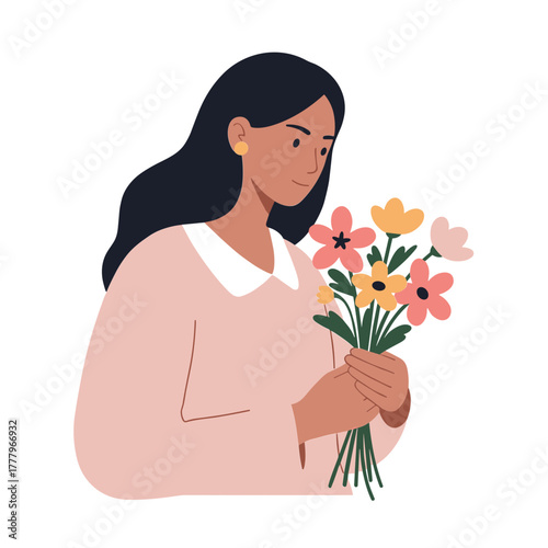 Young woman holding a bouquet of colorful flowers indoors  