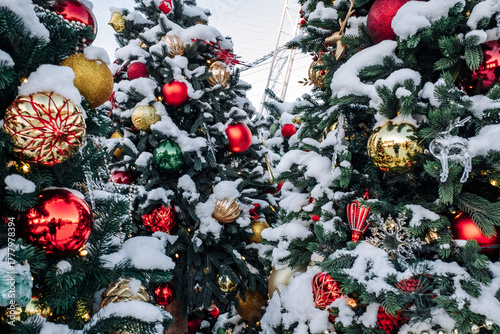 Christmas tree and New Year decorations on the town square on a frosty winter day.