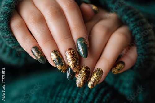 Elegant Hands With Golden Glitter Nails, Adorned in a Stylish Green Outfit Ag...