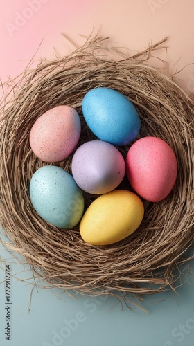 Colorful Easter Eggs Arranged in a Nest on a Pastel Background for Spring Cel...