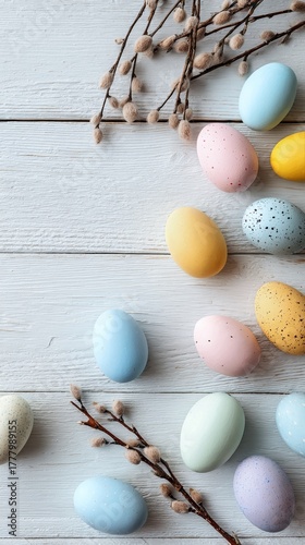 Colorful Easter Eggs and Willow Branches on Wooden Surface for Spring Decoration