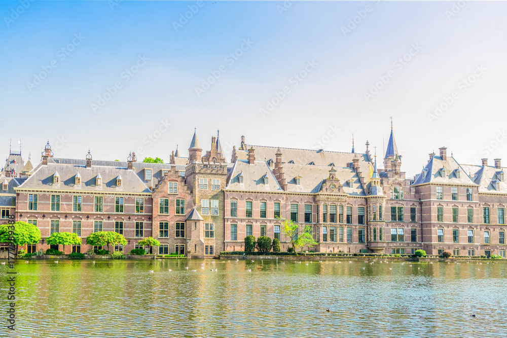 Fototapeta premium facade of Binnenhof - Dutch Parliament with Hofvijver pond, The Hague, Holland
