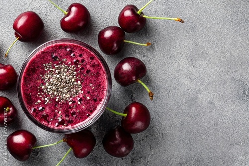 Smoothie Bowl With Cherries and Chia Seeds on a Gray Background