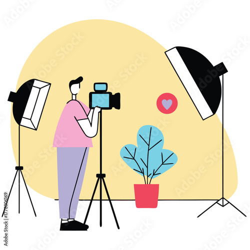 Videographer captures content with professional studio lighting and camera