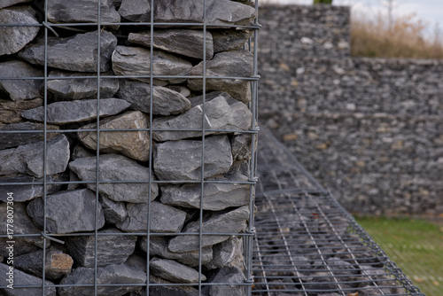 Gabion retaining wall made of stones for slope stabilization and landscape architecture