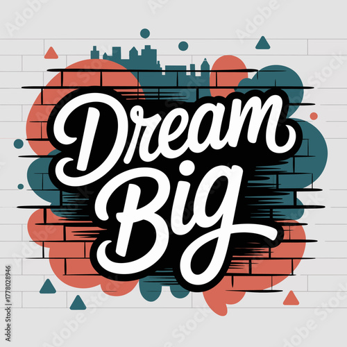 Inspirational dream big typography art with abstract colorful paint splatters and brick texture overlay on a light wood background conveying motivation and aspiration