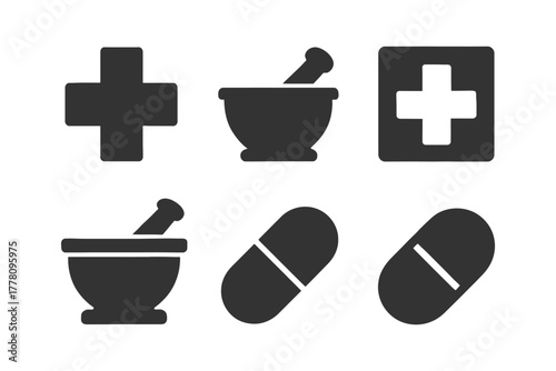 Medical symbols set with cross, mortar and pestle, and capsules.