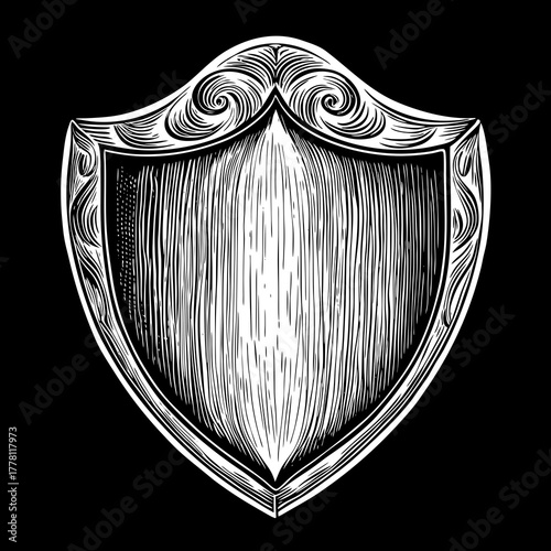 Ornate shield emblem with scrollwork and vertical hatching
