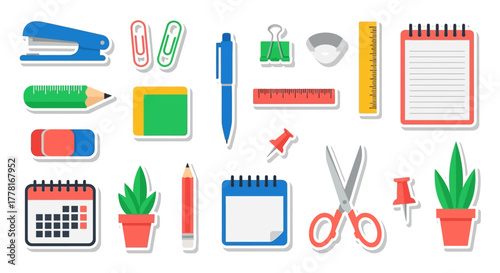 Flatlay of diverse stationery items arranged on a white backdrop