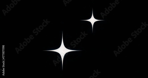 Displaying two white four-point stars occupying left and upper right of dark canvas, copy space