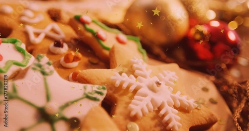 With golden overlay appearing, camera zooming on snowflake cookie revealing icing details