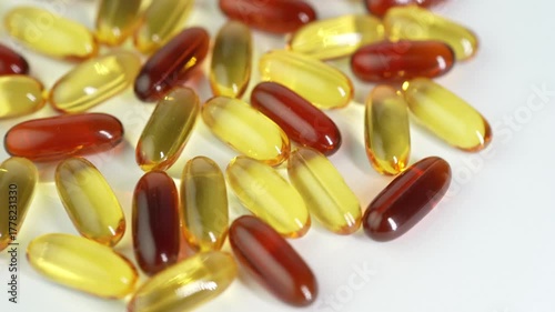 capsules mix softgel of food supplements, fish oil, omega 3, vitamin E, oval gelatin capsules