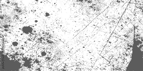 Abstract black and grey grunge texture background with ink splatter, perfect for a vintage pattern frame design effect