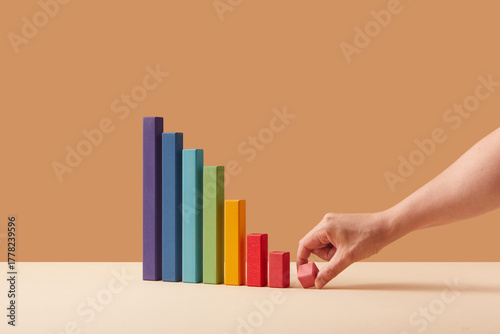 Hand places last block on descending chart