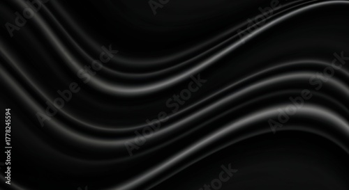 Elegance in Black Silk:  A close-up captures the flowing, sensuous folds of a dark silk fabric, highlighting its luxurious texture and depth. 